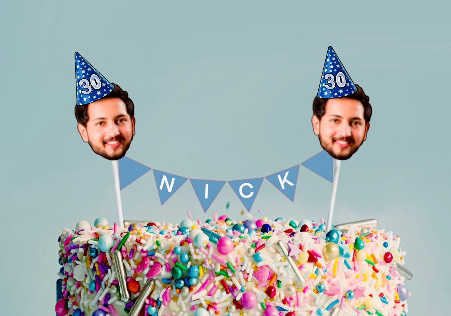 30th birthday cake with custom face bunting topper and blue party hats, name “Nick,” and colourful sprinkle decoration. Perfect personalised cake topper for milestone celebrations.