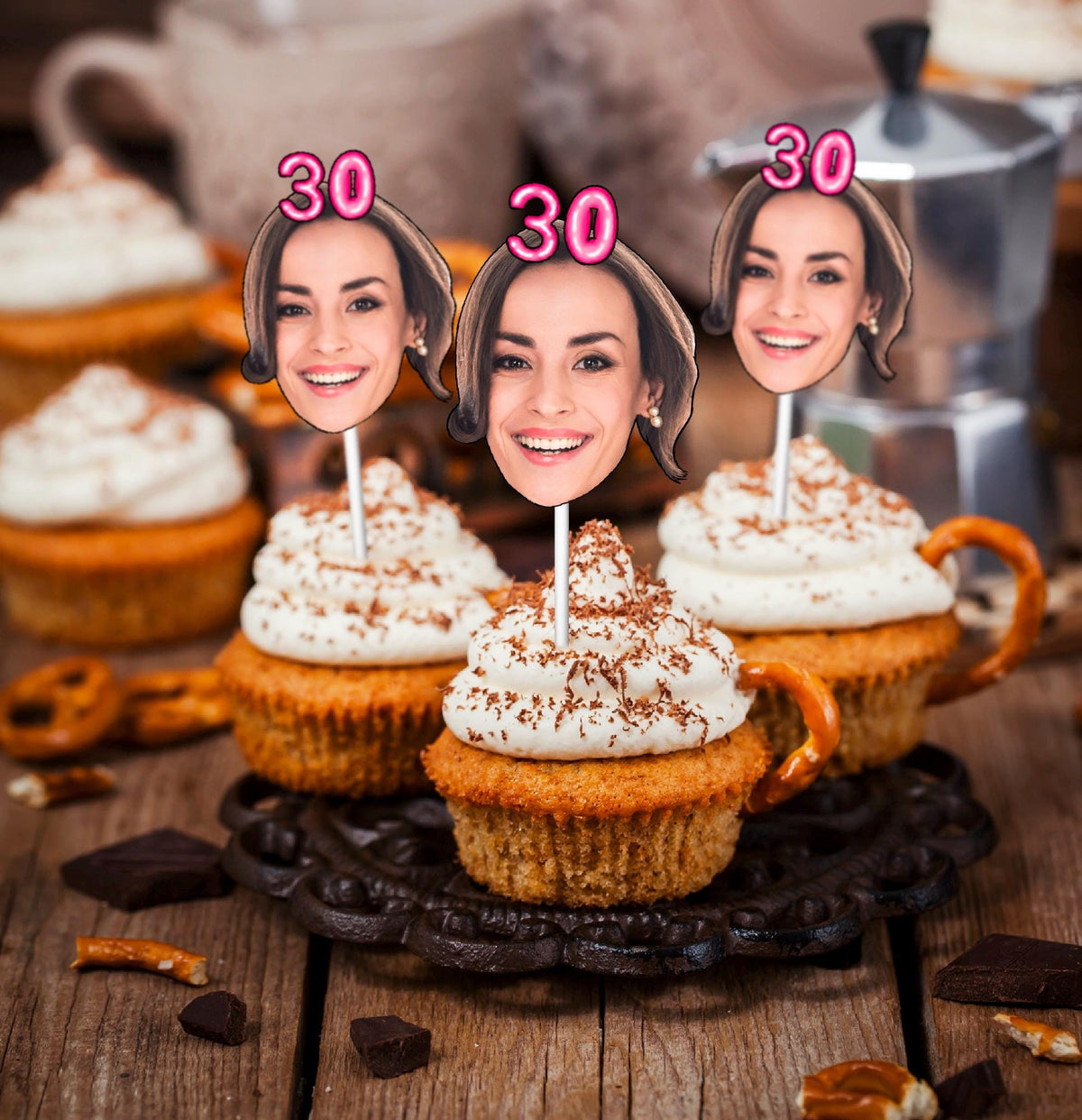 30th birthday cupcakes with personalised toppers featuring the birthday person’s face and pink “30” design. Fun custom party decorations for milestone celebrations.